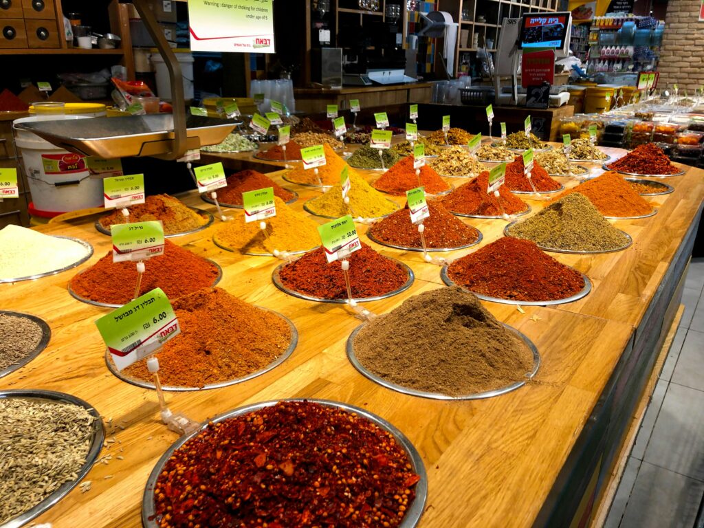 Assorted ground spices at a market