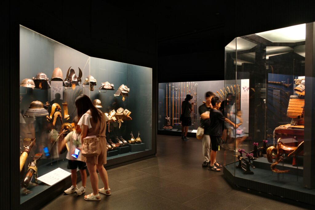 People viewing exhibits in a museum