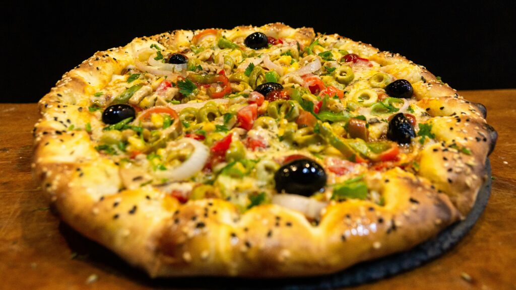 Pizza with vegetables and olives