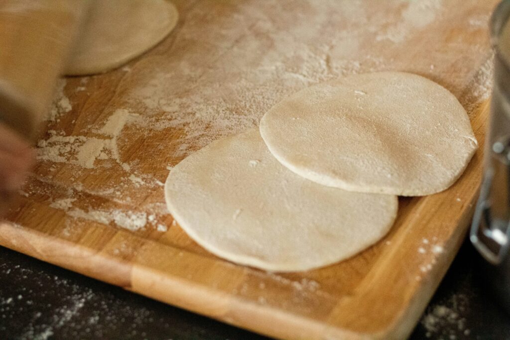 Corn tortillas on a cutting board