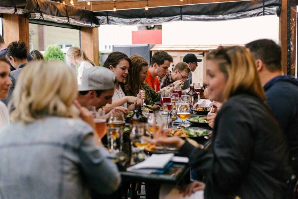 Group dining together at a long table