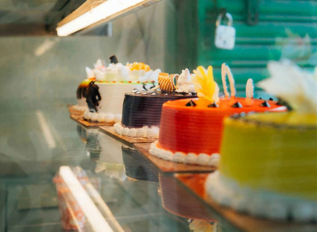 Colorful cakes in a display case