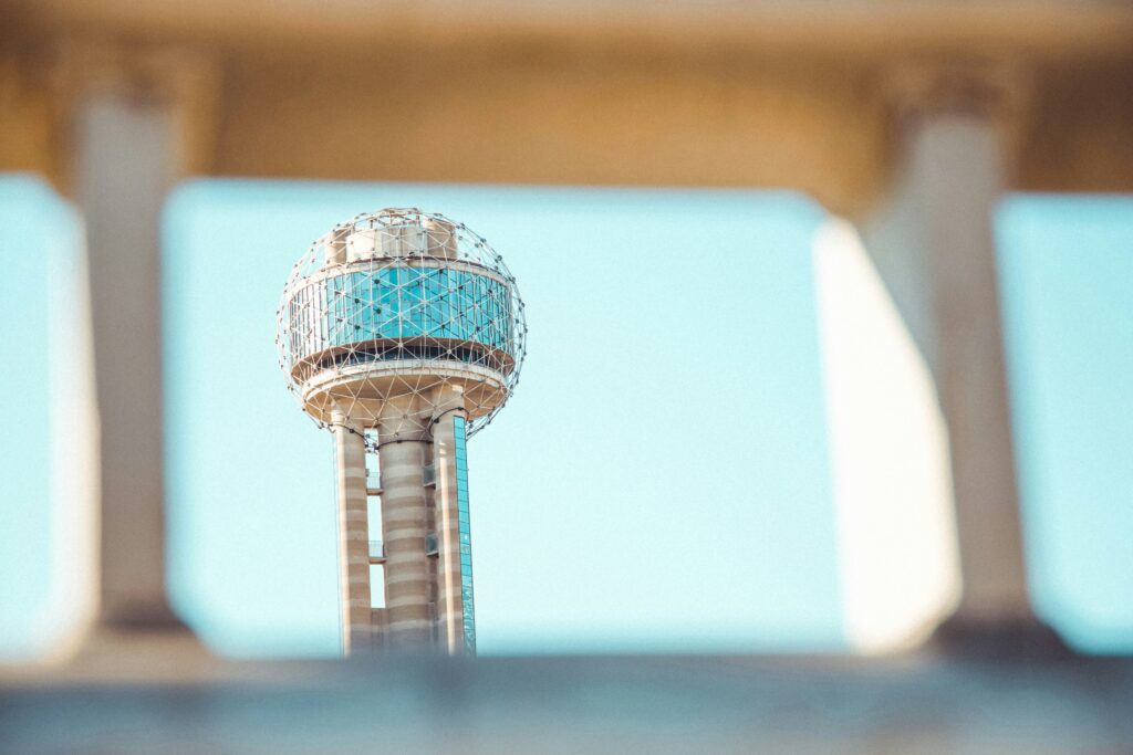 Reunion Tower observation sphere viewed through a concrete structure